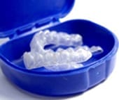 Photo of teeth whitening trays in a blue case.