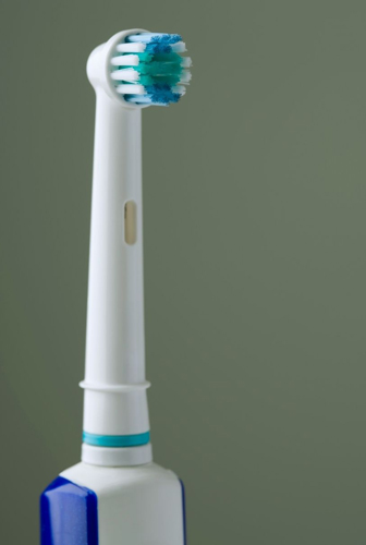 Electric sonic toothbrush - for information on toothbrushes and dental bonding