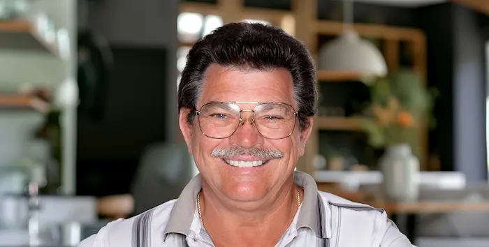 Delaune Dental patient Charles Fenger smiling